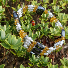 Load image into Gallery viewer, 23&quot; magnetic hematite and citrine bead chain that can be worn in different ways as a necklace and bracelet - Callibeau Jewellery
