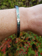 Load image into Gallery viewer, Black Mother of Pearl hinged bangle with magnetic close - Callibeau Jewellery
