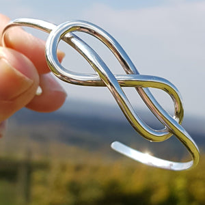 Silver single reef knot torque bangle - Callibeau Jewellery