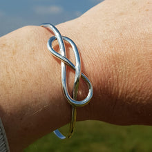 Load image into Gallery viewer, Silver single reef knot torque bangle - Callibeau Jewellery
