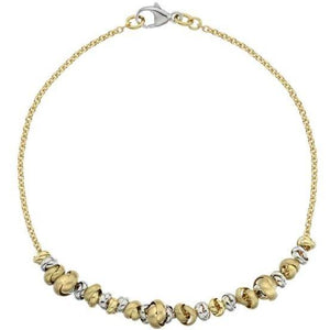 9ct yellow & white gold love knot 7"/19cm bracelet - Callibeau Jewellery