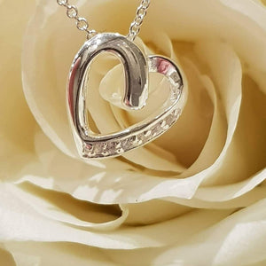 Silver, cubic zirconia classic set heart pendant on silver, trace chain 18" with adjuster @ 16" - Callibeau Jewellery